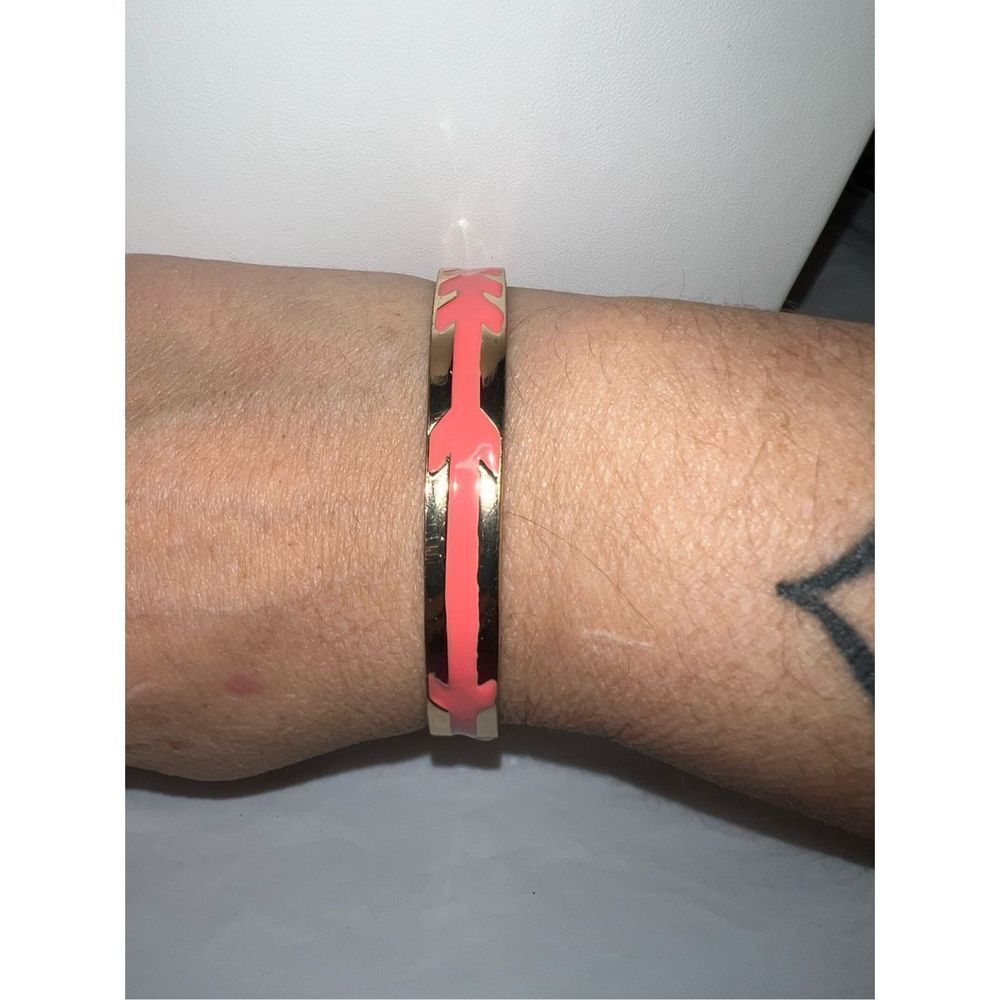 Gold Tone and Pink Enameled Arrow Bangle Bracelet